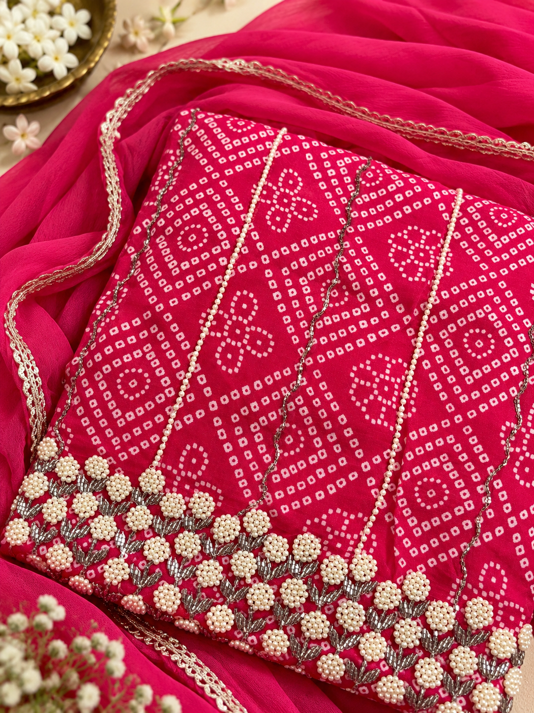 Pink Unstitched Suit Set with Pearl Embellishments & Golden Border Dupatta